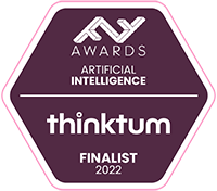 A six-sided dark purple badge has a horizontal line through it and FF Awards Artificial Intelligence above the line and finalist 2022 and the thinktum wordmark below.